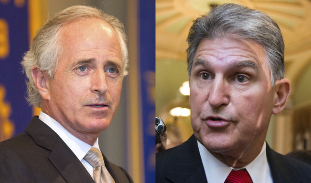 Sen. Bob Corker, R-Tenn., left, and Sen. Joe Manchin, D-W. Va., have said that talks on the government shutdown and the debt ceiling have stalled. (AP File)
