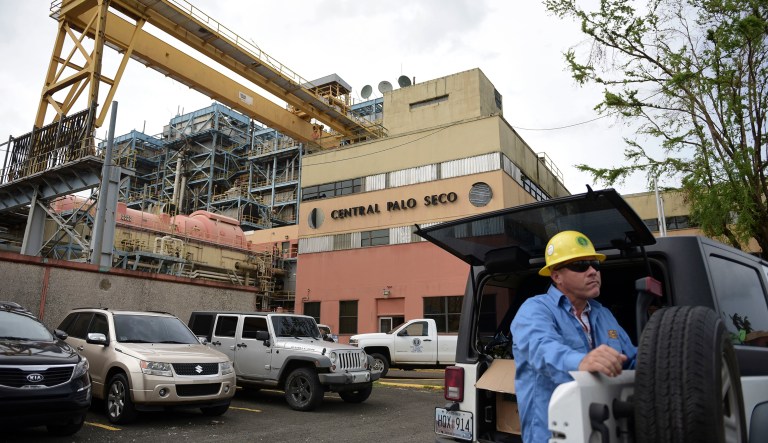 Four months after Hurricane Maria rolled across the center of Puerto Rico, power is still out for nearly 30 percent of people as the work to restore miles of transmission and distribution lines grinds on. (AP Photo/Carlos Giusti)