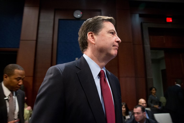 "Our job is not to tell the American people what to do about it, we're just here to tell you that there is a big problem, and that darkness is going to grow and grow and grow and change our world," James Comey said. (AP Photo/Andrew Harnik)