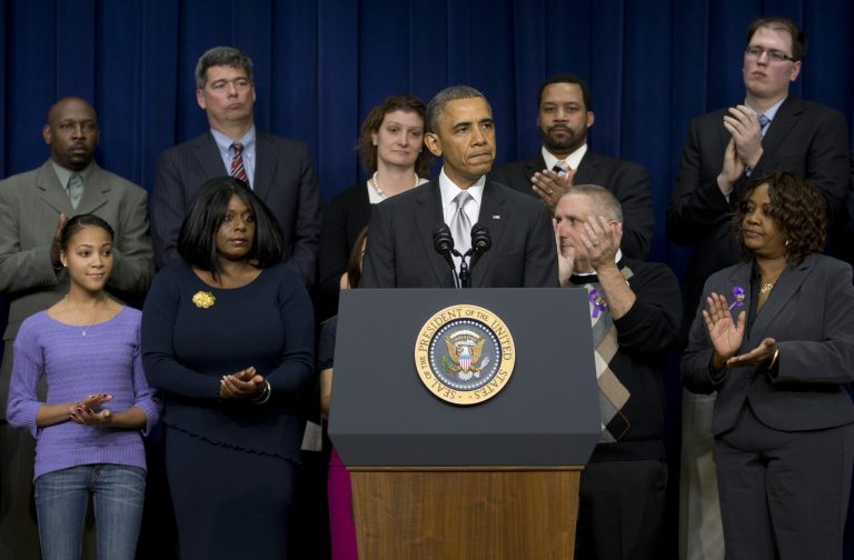 President Obama pauses as he speaks about the new health care law in the Eisenhower Executive Office Building on the White House complex in Washington on Tuesday. (AP Photo/Carolyn Kaster)