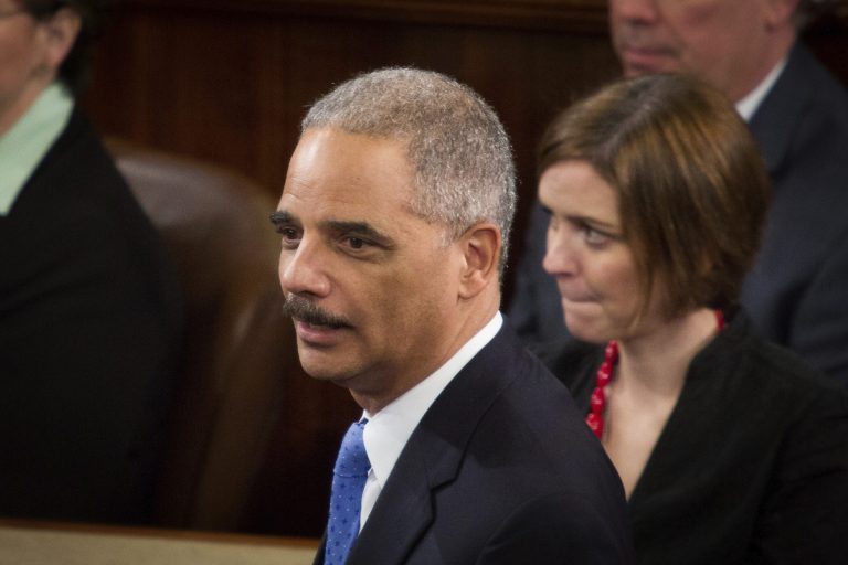 U.S. Attorney General Eric Holder arrives on the House floor before President Obama delivers his State of the Union address on Tuesday, Jan. 28th, 2014. (Examiner/Graeme Jennings)