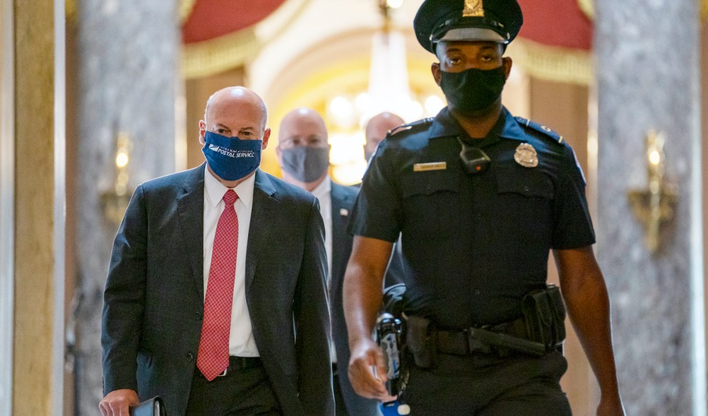 Postmaster general clashes with House Democrats over mail delays