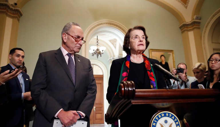 Senate Judiciary Committee Ranking Member Sen. Dianne Feinstein, D-Calif., speaks to the media, accompanied by Senate Minority Leader Chuck Schumer, D-N.Y., about the FBI report on sexual misconduct allegations against Supreme Court nominee Brett Kavanaugh, on Capitol Hill, Thursday, Oct. 4, 2018 in Washington.