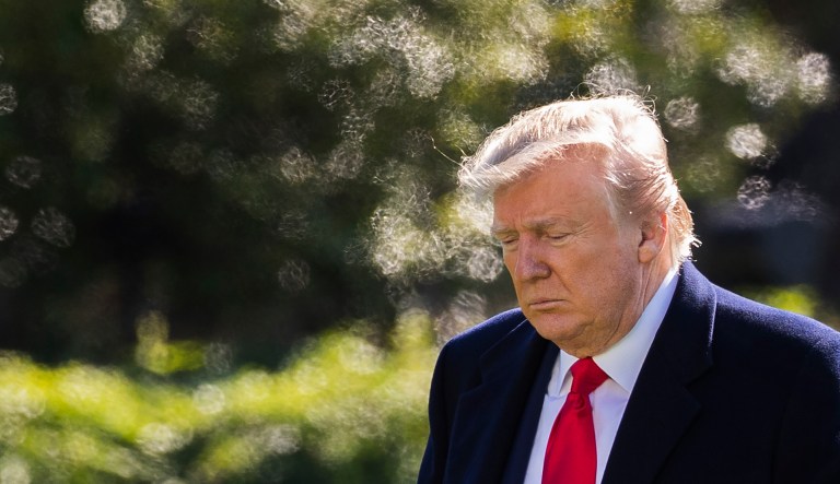 President Donald Trump walks on the South Lawn upon arrival at the White House in Washington, Sunday, Nov. 3, 2019.