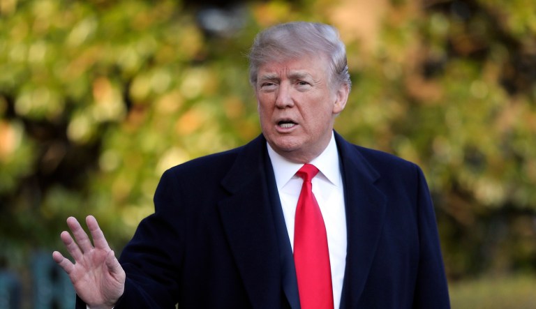 President Trump stops to make remarks to members of the media before walking across the South Lawn of the White in Washington.