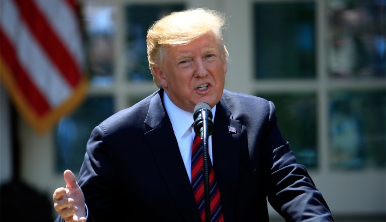 President Donald Trump listens to a question from a reporter as he speaks about the coronavirus in the James Brady Press Briefing Room of the White House, Monday, April 6, 2020, in Washington. 