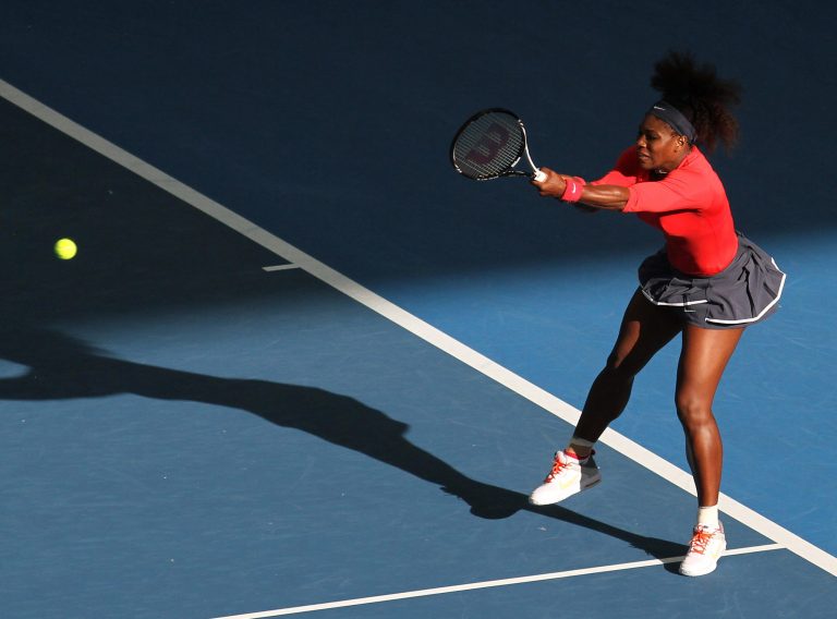   Serena Williams of the U.S. plays a shot during her first round match against Varvaro Lepchenko of the U.S. during the Brisbane International tennis tournament in Brisbane, Australia, Sunday, Dec. 30, 2012. (AP Photo/Tertius Pickard)  