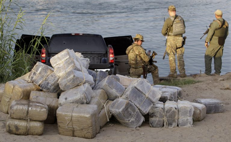 U.S. Customs and Border Patrol and Texas Department of Public Safety seize 57 bundles of marijuana weighing more than 1,200 pound at the Texas border along the Rio Grande, Wednesday, June 8, 2011 in Abram, Texas. (AP Photo/Eric Gay)