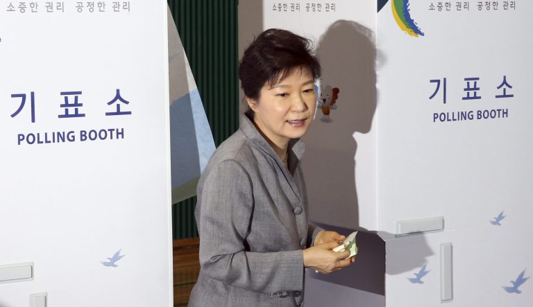 South Korean President Park Geun-hye comes out after casting her vote for local elections at a polling station in Seoul, South Korea, Wednesday, June 4, 2014. South Koreans began voting Wednesday in local elections seen as a test of how the public feels about President Park Geun-hye's handling of April's deadly ferry sinking. (AP Photo/Yonhap, Do Kwang-hwan) KOREA OUT