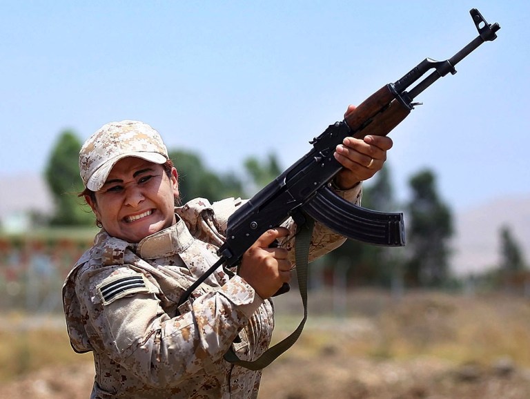 A woman from an elite unit of female Kurdish Peshmerga fighters trains in Sulaimaniyah, 160 miles northeast of Baghdad, Iraq, in this Thursday, July 3, 2014 photo. (AP Photo)