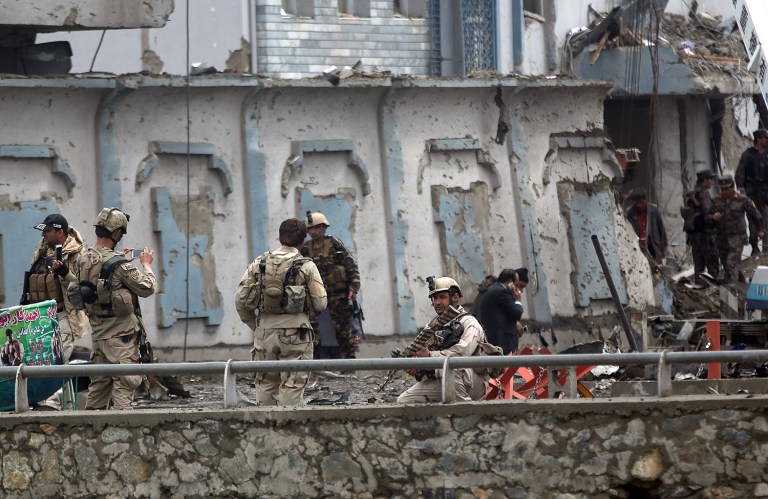 The attack began when a suicide bomber detonated a car bomb outside the compound of the offices of the Directorate of Security for Dignitaries, the elite security team that protects senior government officials. (AP Photo/Massoud Hossaini)