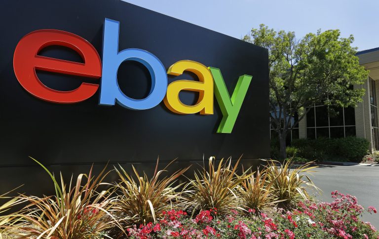 This Tuesday, July 16, 2013 photo shows an eBay sign at eBay headquarters in San Jose, Calif. Ebay Inc. reports earnings after the U.S. stock market closes on Wednesday, Jan. 22, 2014. (AP Photo/Ben Margot)