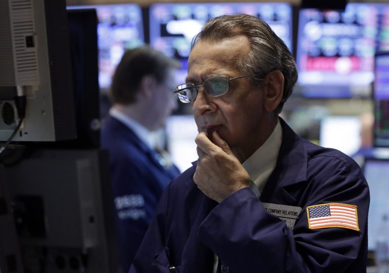 AP/Richard Drew 
Specialist Joseph Quaglieri looks at a monitor as he works on the floor of the New York Stock Exchange on Thursday.