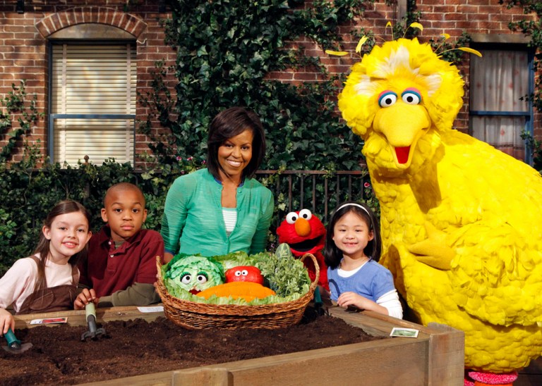 Under an agreement being announced Wednesday at the White House, the nonprofit organization behind the popular children's educational program will allow the produce industry to use Elmo, Big Bird and Sesame Street's other furry characters to help market fruits and vegetables to kids. (AP Image)