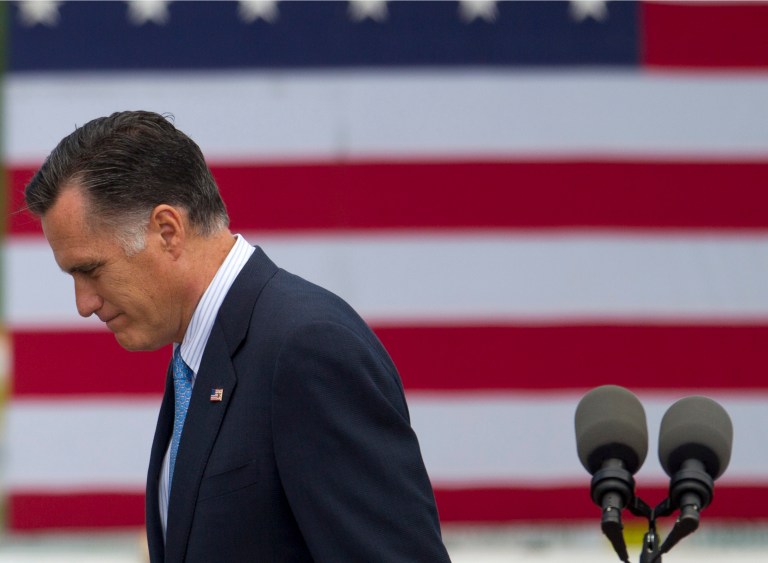 Republican presidential candidate, former Massachusetts Gov. Mitt Romney leaves the stage after making statement on the shootings in Colorado on Friday, July 20, 2012 in Bow, N.H.  (AP Photo/Evan Vucci)