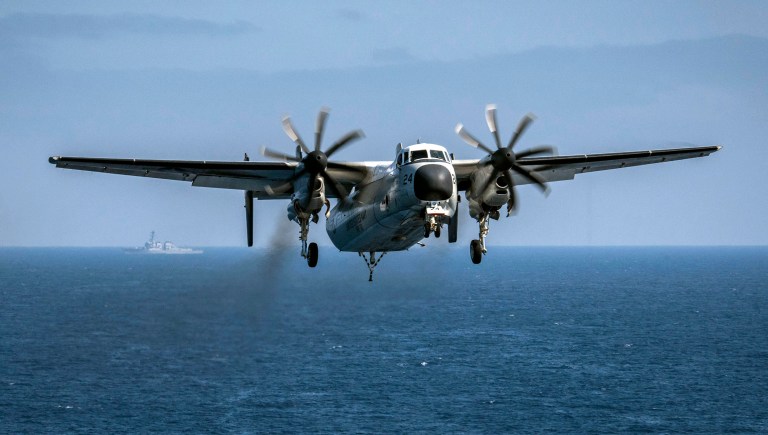 The C-2A Greyhound aircraft, which was traveling to the aircraft carrier USS Ronald Reagan when it crashed the day before Thanksgiving in the Philippine Sea, rests at a depth of about 18,500 feet (5,640 meters), the Japan-based 7th Fleet said in a statement Saturday, Jan. 6, 2018. (Mass Communication Specialist 3rd Class Alex Corona/U.S. Navy via AP, File)