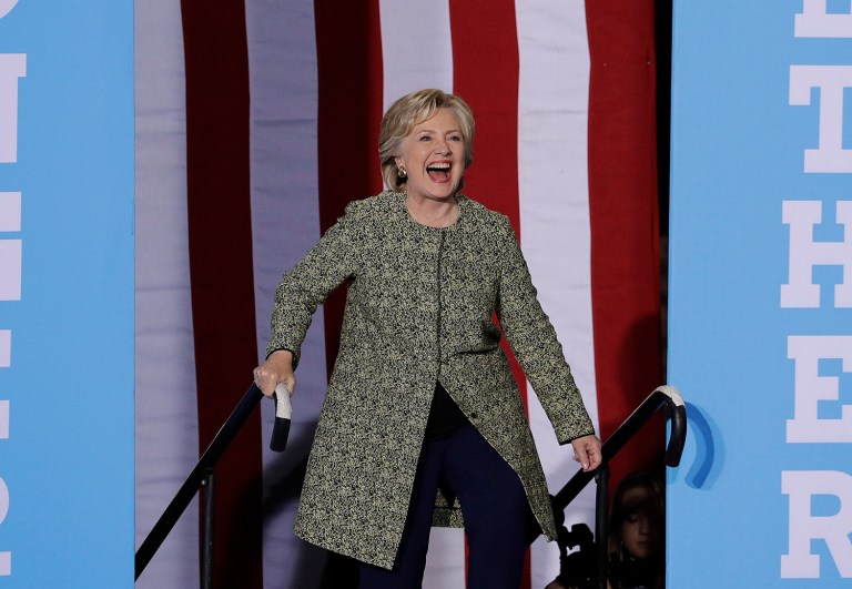 According to a new poll, Hillary Clinton has a 9 percentage point lead, 51-42, on Donald Trump in a two-way race among likely voters in Pennsylvania. (AP Photo/John Locher)