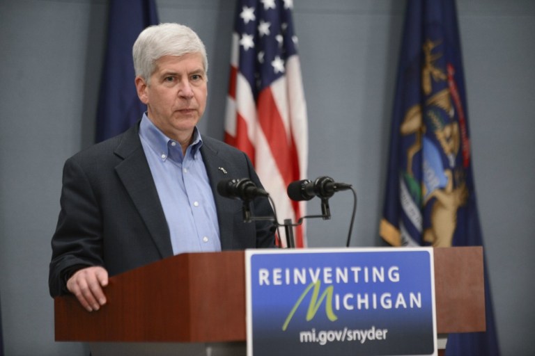 A solemn Rick Snyder held a press conference after the charges were announced, and told reporters he has not been asked for an interview by Attorney General Bill Schuette or other investigators. (AP Photo)