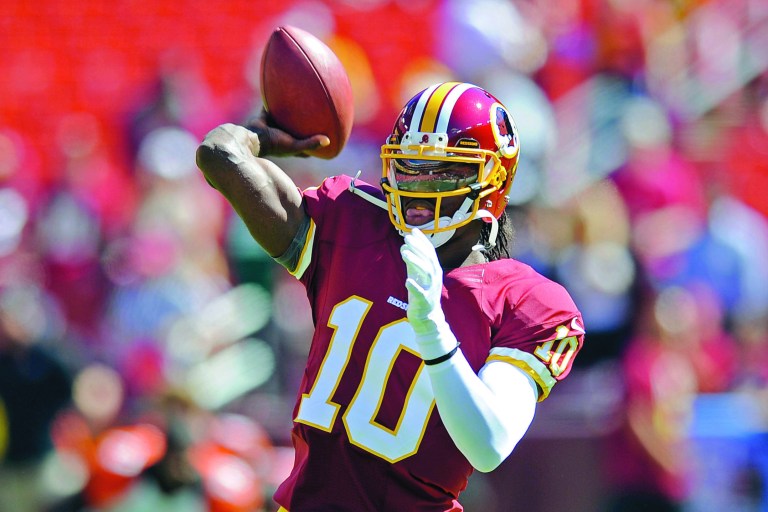 Nick Wass/AP
Washington Redskins rookie quarterback Robert Griffin III has been sacked nine times this season.
