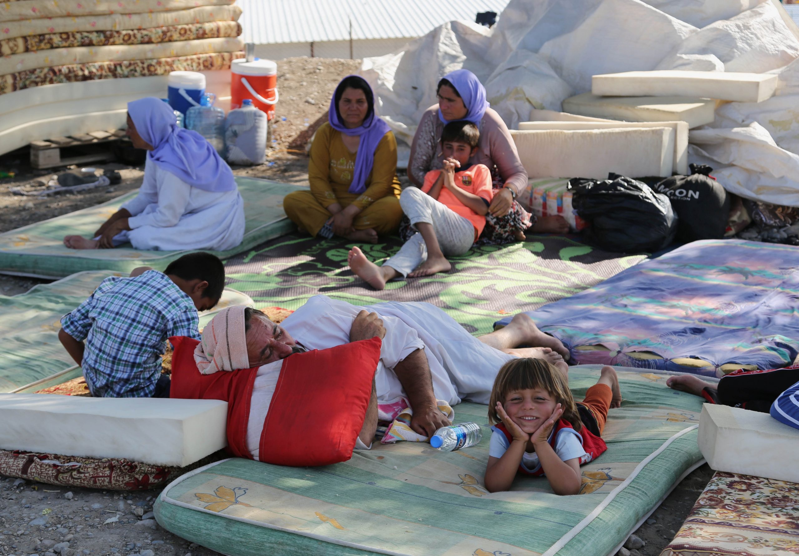 Islamic fighters kill scores of Yazidi men in Iraq