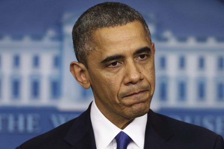   President Barack Obama pauses as he speaks to reporters about the fiscal cliff in the Brady Press Briefing Room at the White House in Washington, Friday, Dec. 21, 2012. (AP Photo/Charles Dharapak)  