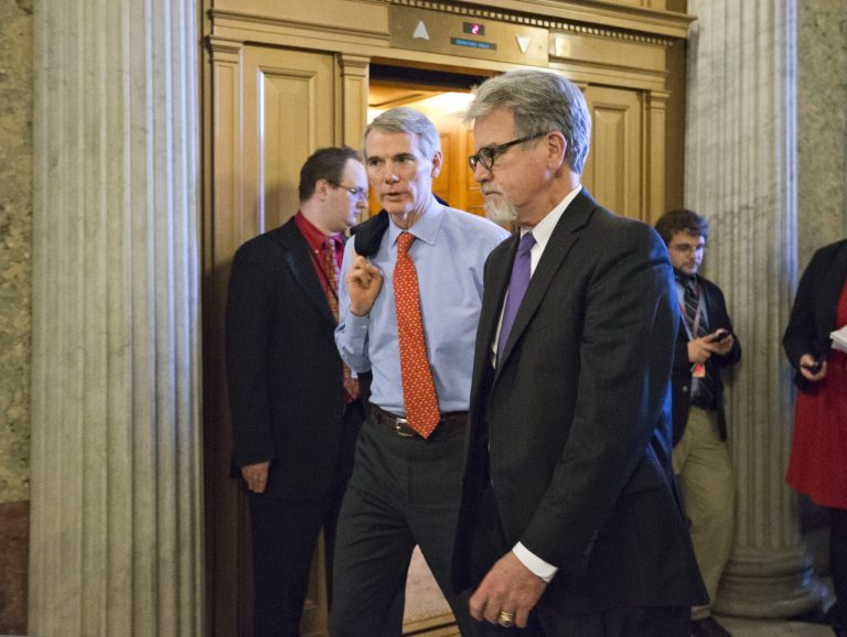 Sens. Rob Portman, R-Ohio, left, and Tom Coburn, R-Okla., wish to prohibit federal employees from doing union work on the taxpayers' dime. (AP File)