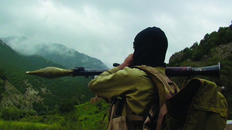 FILE -- In this Sunday Aug. 5, 2012 file photo, a Pakistani Taliban militant holds a rocket-propelled grenade at the Taliban stronghold of Shawal, in Pakistani tribal region of Waziristan, Pakistan. Pakistani officials said Saturday that it is investigating whether the son of the founder of the powerful Haqqani militant network, Badruddin Haqqani, was killed in a U.S. drone strike this week. The U.S. has long viewed the Haqqani network as one of the biggest threats to U.S. and NATO forces in Afghanistan as well as the country's long term stability. (AP Photo/ Ishtiaq Mahsud, File)