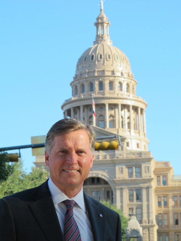 Railroad Commission Chairman Barry Smitherman stands for a portrait in front of the Capitol in Austin on Oct. 22. Smitherman is one of three top Republicans vying for their party's nomination for attorney general in primary elections in March. (AP Photo/Will Weissert)