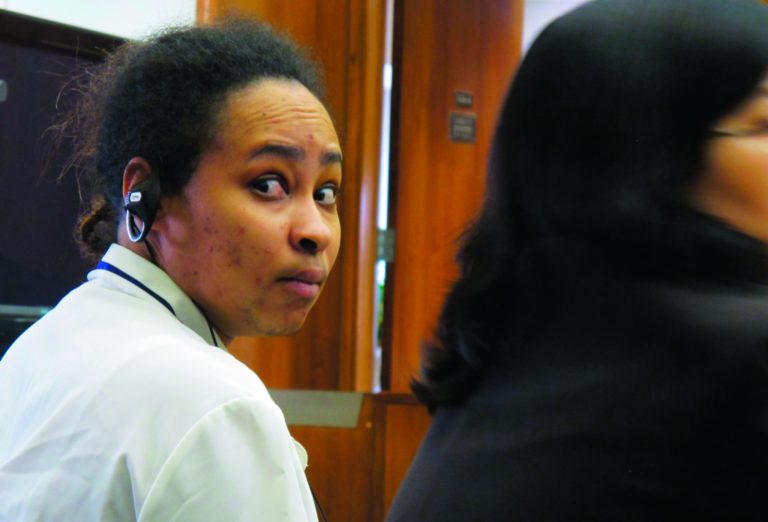 Annette Morales-Rodriguez sits next to her attorneys in a Milwaukee court for the start of her trial on Monday, Sept. 17, 2012. She's accused of killing a young mother by cutting her full-term fetus from her womb last October. (AP Photo/Carrie Antlfinger)