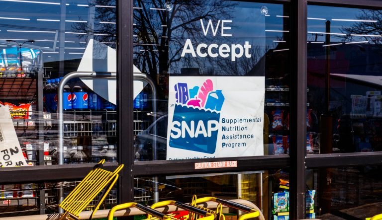 A Sign at a Retailer - We Accept SNAP
