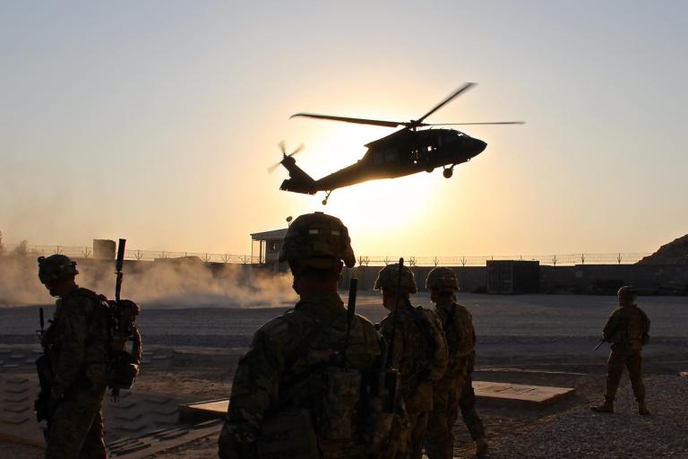 U.S. soldiers assigned to Train, Advise, Assist Command-East prepare for the arrival of a UH-60 Black Hawk helicopter in Nangarhar province, Afghanistan, in 2015. A U.S. soldier was killed in the region on Saturday. (U.S. Army photo)