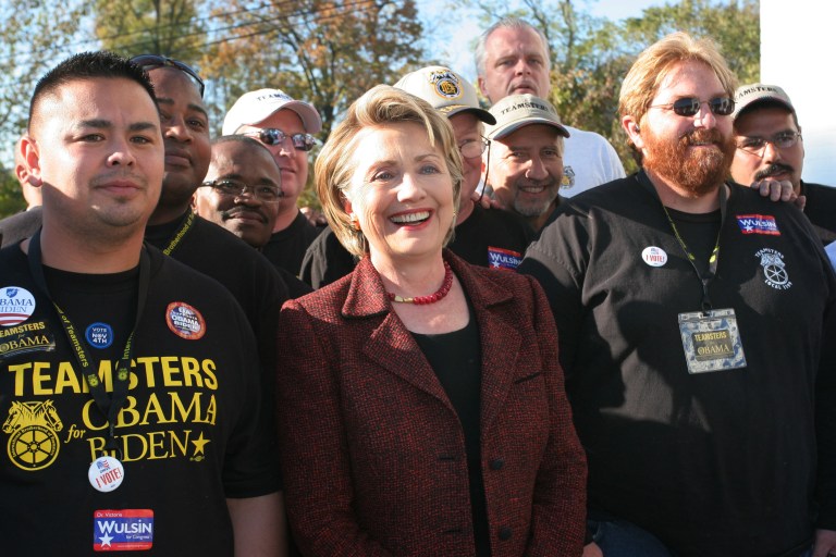 Hillary Clinton stands with various union members at an American Federation of Teachers Union rally in Cincinnati in October 2008. (AP Photo/Tom Uhlman)