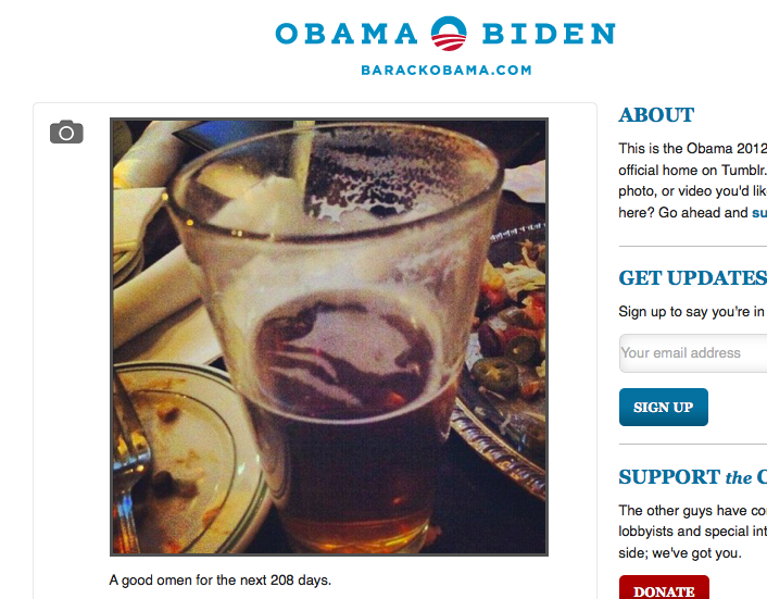 Campaign staffers marvel at Obama logo in a beer