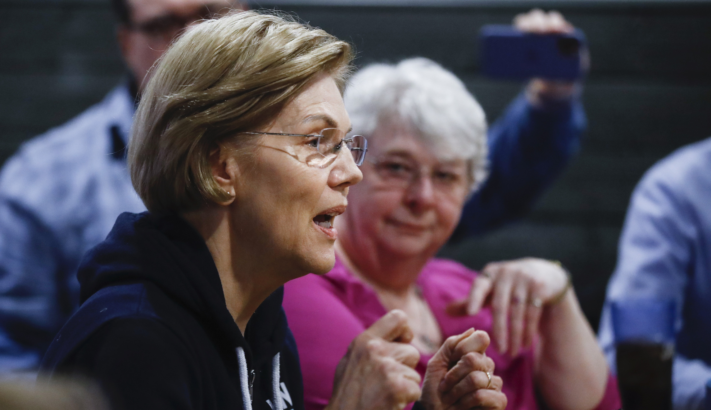 Warren chides Biden and Buttigieg for wanting to work with Republicans