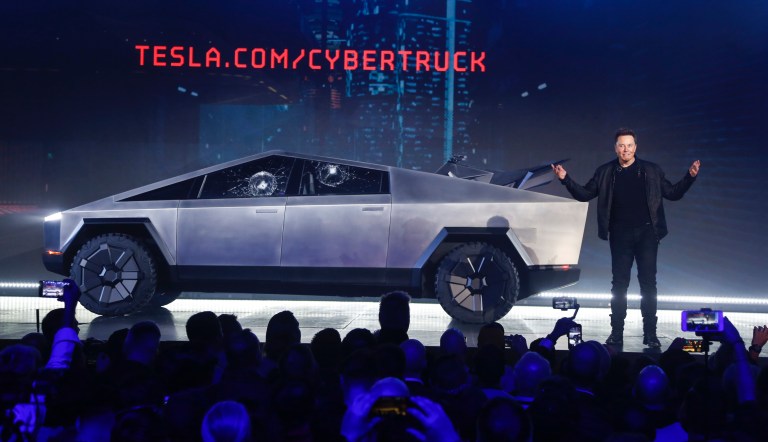 Tesla CEO Elon Musk introduces the CybertTruck at Tesla's design studio Thursday, March 14, 2019, in Hawthorne, Calif.