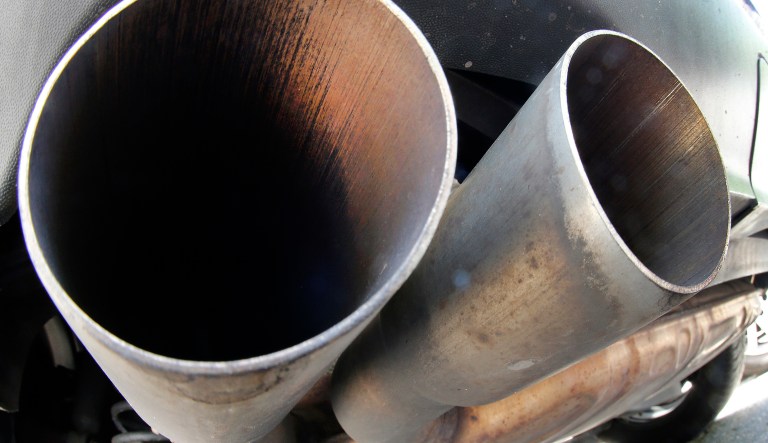 The exhaust pipes of a VW Diesel car are photographed in Frankfurt, Germany, Wednesday, Aug. 2, 2017. German auto bosses, ministers and state governors are considering how to reduce diesel emissions as drivers face the threat of possible bans on driving older diesel cars in some cities. A meeting Wednesday at the Transport Ministry is to bring together leading politicians with bosses from Volkswagen, Porsche, Audi, Mercedes, BMW, Opel and Ford.