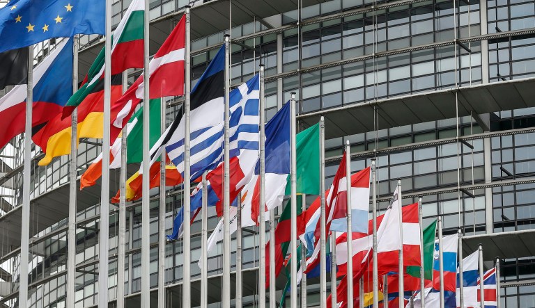 The European flag, left, and the Union Jack, right, fly with other European flags outside the European Parliament in Strasbourg, eastern France, Friday Jan.31, 2020. Britain officially leaves the European Union on Friday.