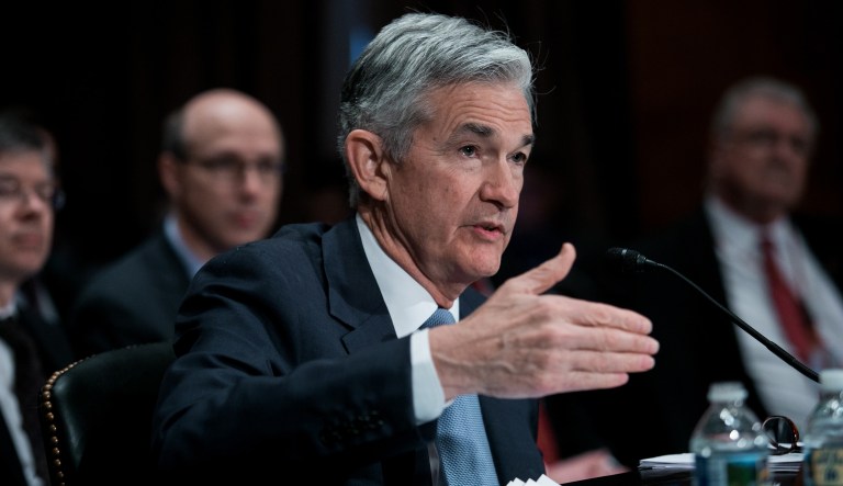 Fed raises rates as it weighs tighter money over the next few years