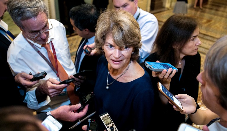 Sen. Lisa Murkowski, R-Alaska, takes questions from reporters on Capitol Hill on Wednesday.