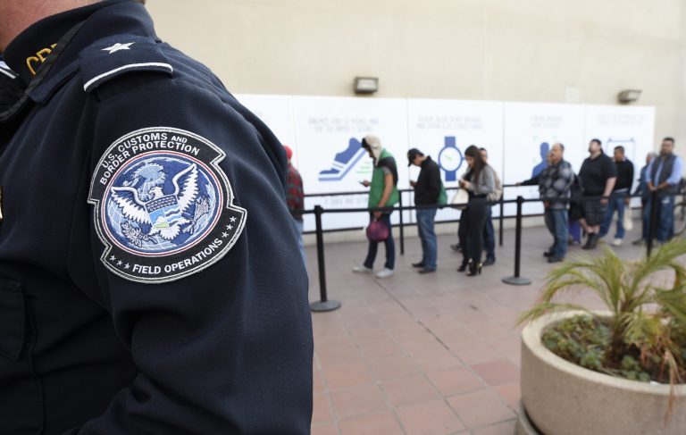 Five changes to immigration policy must be made to better protect the public, a new report says. (AP Photo/Denis Poroy)