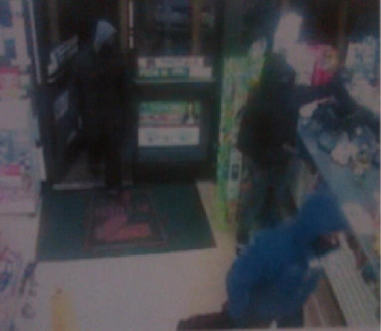 Surveillance footage from a December 2011 robbery at a 7-Eleven convenience store in Temple Hills.