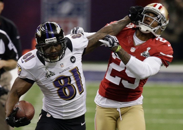 Baltimore Ravens wide receiver Anquan Boldin (81) stiff-arms San Francisco 49ers cornerback Chris Culliver (29) during the second half of the NFL Super Bowl XLVII football game, Sunday, Feb. 3, 2013, in New Orleans. (AP Photo/Gene Puskar)