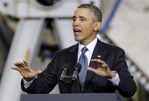 President Barack Obama gestures during a speech about automatic defense budget cuts, Tuesday, Feb. 26, 2013, at Newport News Shipbuilding in Newport News, Va.  (AP Photo/Steve Helber)