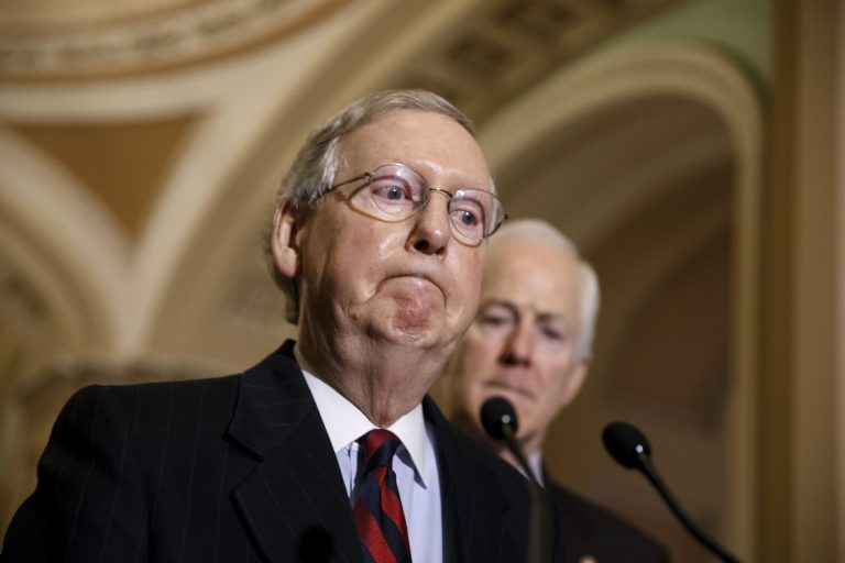 Senate Minority Leader Mitch McConnell of Ky., accompanied by Senate Minority Whip John Cornyn of Texas, meets with reporters on Capitol Hill in Washington, Tuesday, Dec. 9, 2014. (AP Photo/J. Scott Applewhite)
