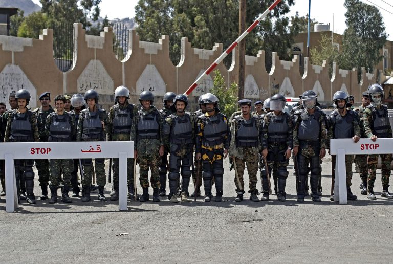 Yemeni soldiers stand guard during a demonstration in front of US embassy in Sanaa, Yemen. (AP Photo/Hani Mohammed)