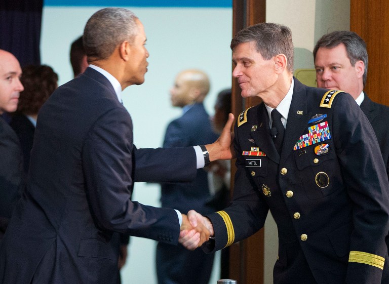 President Obama, left, stops to greet Gen. Joseph Votel, right, his pick to be the next U.S. commander for the Middle East. Senate confirmed Votel on Thursday, according to reports. (AP Photo/Pablo Martinez Monsivais)