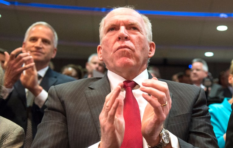 CIA Director John Brennan applauds at a ceremony marking the 10th anniversary of the formation for the Office of the Director of National Intelligence, at its headquarters on April 24, 2015 in McClean, Va. (Photo by Kevin Dietsch-Pool/Getty Images)