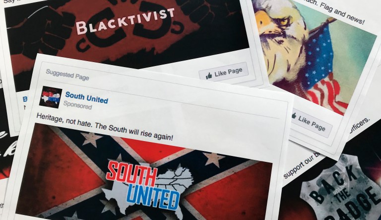 Some of the Facebook ads linked to a Russian effort to disrupt the American political process and stir up tensions around divisive social issues, released by members of the U.S. House Intelligence committee, are photographed in Washington, on Wednesday, Nov. 1, 2017. The ads, dozens of which were disclosed for the first time, were released as representatives of leading social media companies faced criticism on Capitol Hill about why they hadn't done more to combat Russian interference on their sites and prevent foreign agents from meddling in last year's election.