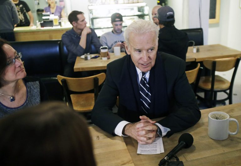 Vice President Joe Biden meets with women who have either signed up for coverage or have helped others sign up for insurance under the federal health care law  during a stop at Moose and Sadie's coffee shop Wednesday, Feb. 19, 2014, in Minneapolis. (AP Photo/Jim Mone, Pool)