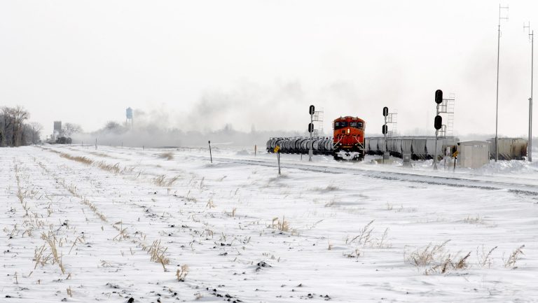 Crude oil tanker cars continue to burn at the site of an oil train derailment on Dec. 31 in Casselton, N.D. (AP Photo/Bruce Crummy)